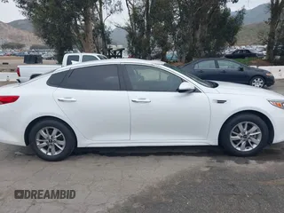 2018 Kia Optima LX with VIN 5XXGT4L3XJG215632, listed as a IAAI auction lot 41785035 with 94,854 mi miles and . Bid and sale history available at DreamBid. Image 13.