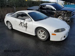 1998 Mitsubishi Eclipse with VIN 4A3AK44YXWE152916, listed as a Copart auction lot 84327974 with 115,415 mi miles and Salvage Title. Bid and sale history available at DreamBid. Image 4.