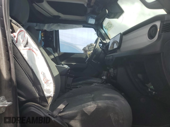 2024 Jeep Wrangler Sport S with VIN 1C4PJXDG9RW204575, listed as a Copart auction lot 46354145 with 29,874 mi miles and Salvage title. Bid and sale history available at DreamBid. Image 7.