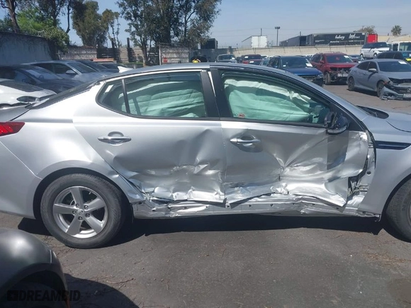 2015 Kia Optima LX with VIN 5XXGM4A71FG466873, listed as a IAAI auction lot 41851355 with 13,880 mi miles. Bid and sale history available at carsss.com. Image 6.