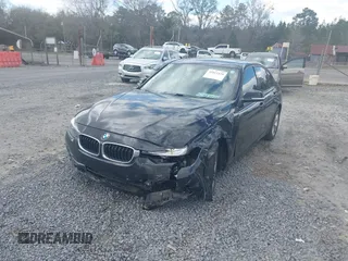 2016 BMW 3 Series 328i with VIN WBA8E9G52GNU30083, listed as a IAAI auction lot 41811439 with 55,396 mi miles. Bid and sale history available at carsss.com. Image 2.