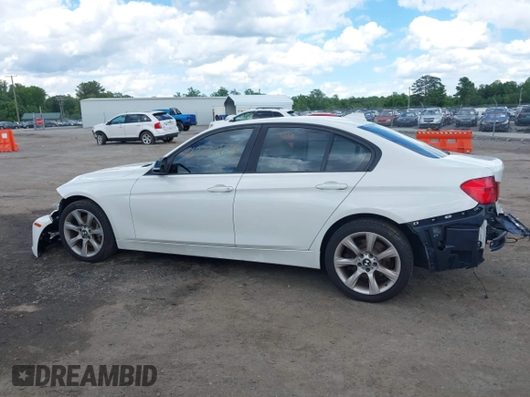 2013 BMW 3 Series 335i xDrive with VIN WBA3B9C59DJ899358, listed as a IAAI auction lot 42321863 with 127,700 mi miles and . Bid and sale history available at DreamBid. Image 14.