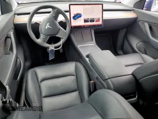 2022 Tesla Model Y Long Range z VIN 7SAYGDEEXNF372693, wystawiony jako Copart lot #53275555 z przebiegiem 51 165 mil mil oraz Szkody całkowita. Historia ofert i sprzedaży dostępna na DreamBid. Obrazek 8.