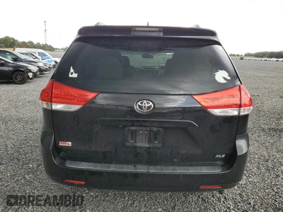2012 Toyota Sienna XLE AAS with VIN 5TDYK3DC1CS279236, listed as a Copart auction lot 63329165 with 143,937 mi miles and Salvage title. Bid and sale history available at DreamBid. Image 6.
