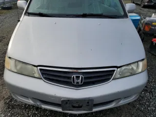 2002 Honda Odyssey EX z VIN 2HKRL18692H578746, wystawiony jako Copart lot #51281845 z przebiegiem 282 844 mil mil oraz Szkoda całkowita • Salvage title. Historia ofert i sprzedaży dostępna na DreamBid. Obrazek 12.