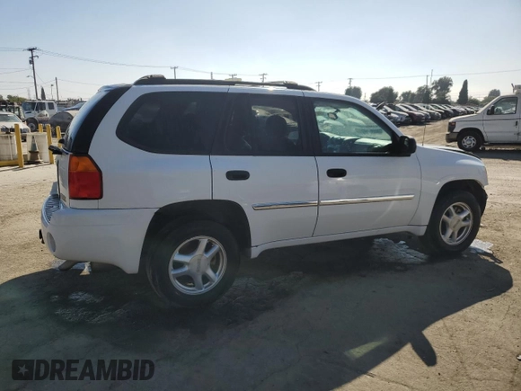 2008 GMC Envoy SLE1 with VIN 1GKDS13S182137239, listed as a Copart auction lot 69627594 with 135,160 mi miles and Salvage Title. Bid and sale history available at DreamBid. Image 3.