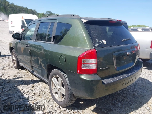 2008 Jeep Compass Sport with VIN 1J8FF47WX8D758998, listed as a IAAI auction lot 42061944 with 271,977 mi miles and . Bid and sale history available at carsss.com. Image 3.
