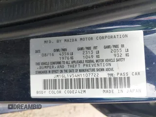 2017 Mazda Mazda6 Touring with VIN JM1GL1V54H1107722, listed as a IAAI auction lot 41521257 with 142,129 mi miles. Bid and sale history available at carsss.com. Image 9.