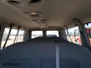2014 Ford Econoline Wagon XL with VIN 1FBNE3BL2EDA82379, listed as a Copart auction lot 61391474 with 77,151 mi miles and Salvage Title. Bid and sale history available at carsss.com. Image 10.