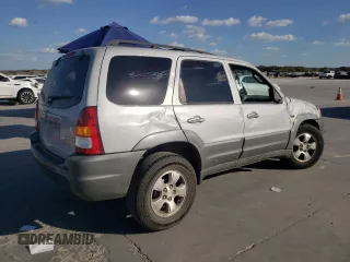2002 Mazda Tribute LX with VIN 4F2YU09182KM64860, listed as a Copart auction lot 77391824 with 207,965 mi miles and Salvage Title. Bid and sale history available at DreamBid. Image 3.