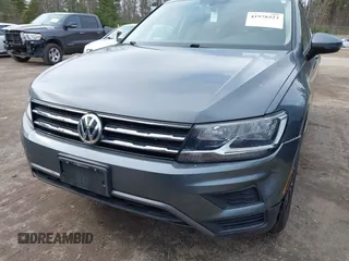 2021 Volkswagen Tiguan SE with VIN 3VV2B7AX6MM054611, listed as a IAAI auction lot 41978323 with 23,029 mi miles and . Bid and sale history available at DreamBid. Image 6.