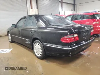 2001 Mercedes-Benz E-Class AWD with VIN WDBJF82J11X056639, listed as a Copart auction lot 49428325 with 145,218 mi miles and Salvage Title. Bid and sale history available at carsss.com. Image 2.
