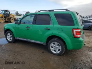 2010 Ford Escape Hybrid with VIN 1FMCU4K30AKC90709, listed as a Copart auction lot 85394774 with 183,092 mi miles and Salvage title. Bid and sale history available at DreamBid. Image 2.