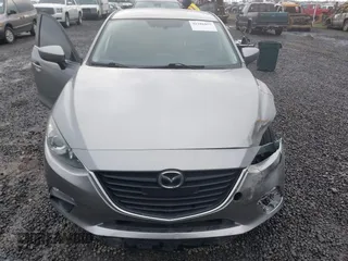 2016 Mazda Mazda3 i Sport with VIN 3MZBM1U76GM306988, listed as a IAAI auction lot 41286055 with 116,175 mi miles. Bid and sale history available at carsss.com. Image 13.