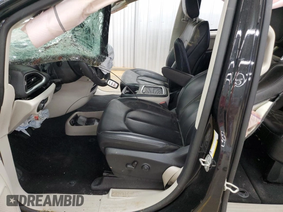 2023 Chrysler Pacifica Touring L with VIN 2C4RC1BG3PR582271, listed as a Copart auction lot 51644595 with 57,930 mi miles and Salvage title. Bid and sale history available at DreamBid. Image 7.