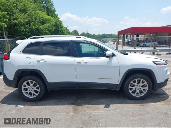 2016 Jeep Cherokee Latitude z VIN 1C4PJMCB2GW372592, wystawiony jako IAAI lot #42493346 z przebiegiem 95 519 mil mil oraz . Historia ofert i sprzedaży dostępna na DreamBid. Obrazek 13.