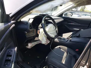 2021 Mazda CX-30 Select z VIN 3MVDMABL3MM233701, wystawiony jako IAAI lot #42086778 z przebiegiem Nie podano mil oraz . Historia ofert i sprzedaży dostępna na DreamBid. Obrazek 18.