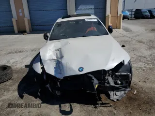 2012 BMW 3 Series 335is with VIN WBAKG1C50CJ217108, listed as a Copart auction lot 56609175 with 105,899 mi miles and Salvage title. Bid and sale history available at DreamBid. Image 5.