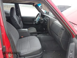 2001 Jeep Cherokee Sport with VIN 1J4FT48S01L537833, listed as a IAAI auction lot 41943255 with 239,473 mi miles. Bid and sale history available at carsss.com. Image 5.