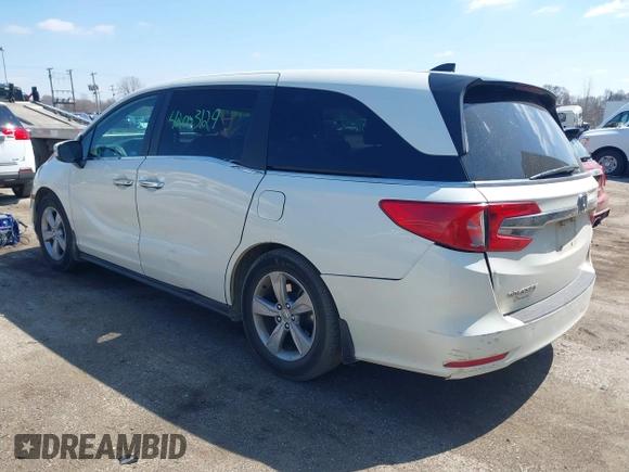 2018 Honda Odyssey EX-L z VIN 5FNRL6H70JB102713, wystawiony jako IAAI lot #42003129 z przebiegiem 410 500 mil mil oraz . Historia ofert i sprzedaży dostępna na DreamBid. Obrazek 3.