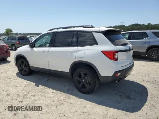 2021 Honda Passport Elite with VIN 5FNYF8H03MB007617, listed as a Copart auction lot 63036345 with 21,757 mi miles and Salvage title. Bid and sale history available at DreamBid. Image 2.