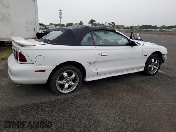 1996 Ford Mustang GT with VIN 1FALP45X9TF225224, listed as a Copart auction lot 66895564 with 113,282 mi miles and Salvage Title. Bid and sale history available at carsss.com. Image 3.