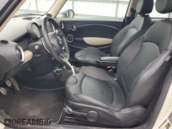 2012 MINI Hardtop S with VIN WMWSV3C53CTY27834, listed as a Copart auction lot 52616845 with 66,919 mi miles and Salvage Title. Bid and sale history available at DreamBid. Image 7.