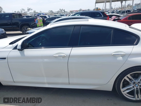 2015 BMW 6 Series 640i with VIN WBA6A0C56FD318007, listed as a IAAI auction lot 42041430 with 78,281 mi miles. Bid and sale history available at carsss.com. Image 14.