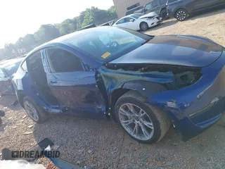 2023 Tesla Model Y Long Range with VIN 7SAYGDEE3PA114256, listed as a IAAI auction lot 42158307 with 19,975 mi miles and . Bid and sale history available at DreamBid. Image 12.