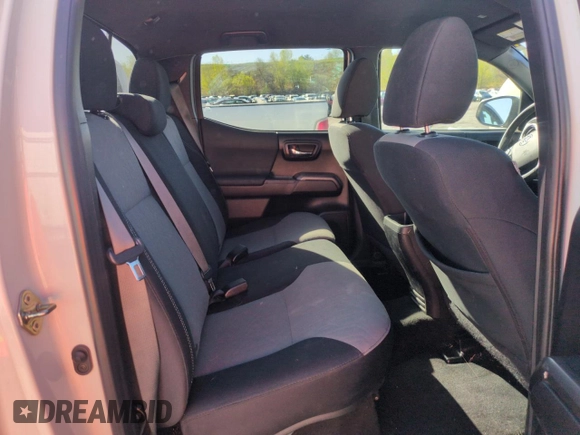 2020 Toyota Tacoma SR5 z VIN 5TFCZ5AN9LX230688, wystawiony jako Copart lot #55305165 z przebiegiem 50 381 mil mil oraz Szkoda całkowita • Salvage title. Historia ofert i sprzedaży dostępna na DreamBid. Obrazek 10.