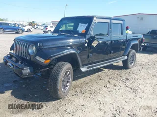 2023 Jeep Gladiator Overland z VIN 1C6HJTFG9PL549685, wystawiony jako IAAI lot #42037635 z przebiegiem 40 734 mil mil oraz . Historia ofert i sprzedaży dostępna na DreamBid. Obrazek 2.