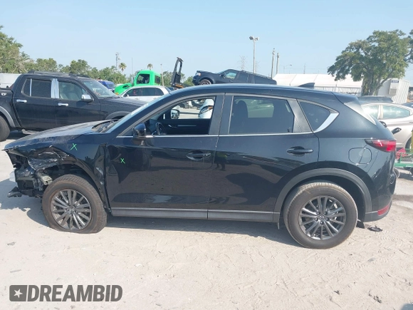 2020 Mazda CX-5 Touring with VIN JM3KFACM2L0770241, listed as a IAAI auction lot 42186952 with 41,590 mi miles and . Bid and sale history available at DreamBid. Image 15.