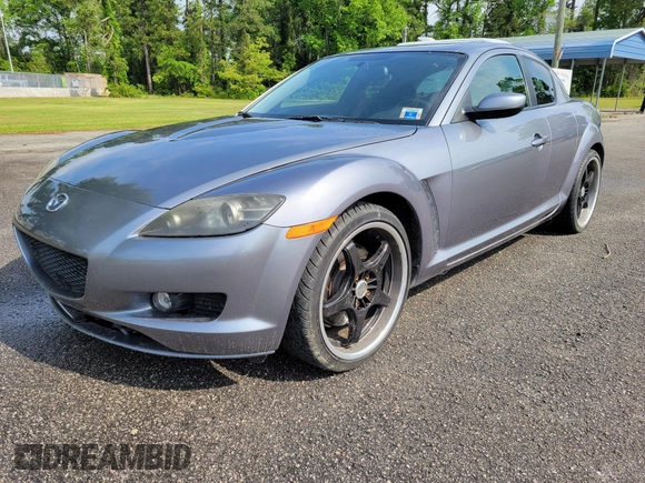 2004 Mazda RX-8 with VIN JM1FE173040113082, listed as a IAAI auction lot 42122741 with 62,483 mi miles. Bid and sale history available at carsss.com. Image 1.