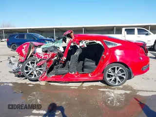 2019 Honda Civic Sport with VIN 2HGFC2F89KH556513, listed as a IAAI auction lot 41676082 with Not Provided miles and . Bid and sale history available at DreamBid. Image 15.