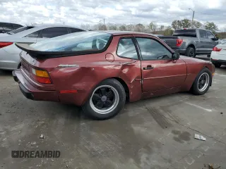 1984 Porsche 944 z VIN WP0AA0948EN461206, wystawiony jako Copart lot #79163494 z przebiegiem 15 862 mil mil oraz Szkoda całkowita • Salvage title. Historia ofert i sprzedaży dostępna na DreamBid. Obrazek 3.