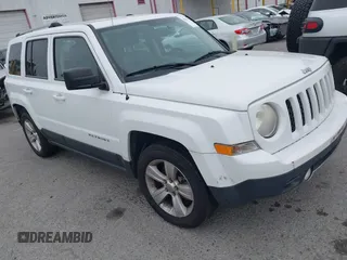 2014 Jeep Patriot Limited z VIN 1C4NJPCB2ED694389, wystawiony jako IAAI lot #42028445 z przebiegiem 128 343 mil mil oraz . Historia ofert i sprzedaży dostępna na DreamBid. Obrazek 1.