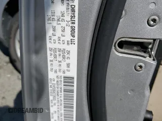 2012 Dodge Journey SXT z VIN 3C4PDDBG0CT293331, wystawiony jako Copart lot #62602995 z przebiegiem 185 605 mil mil oraz Szkoda całkowita • Salvage title. Historia ofert i sprzedaży dostępna na DreamBid. Obrazek 13.