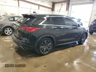 2020 Infiniti QX50 Luxe z VIN 3PCAJ5M37LF108530, wystawiony jako Copart lot #57403415 z przebiegiem 59 201 mil mil oraz Czysty tytuł • Clean title. Historia ofert i sprzedaży dostępna na DreamBid. Obrazek 3.