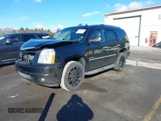 2014 GMC Yukon Denali with VIN 1GKS2EEF9ER140584, listed as a IAAI auction lot 41688659 with 81,995 mi miles. Bid and sale history available at carsss.com. Image 2.