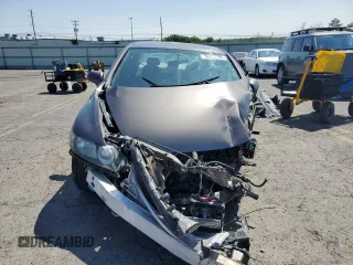 2009 Honda Civic LX z VIN 19XFA16559E020457, wystawiony jako Copart lot #58721185 z przebiegiem Nie podano mil oraz Szkoda całkowita • Salvage title. Historia ofert i sprzedaży dostępna na DreamBid. Obrazek 5.