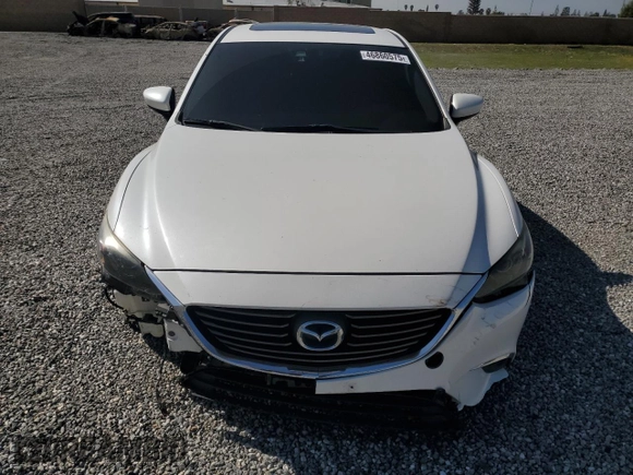 2016 Mazda 6 i Grand Touring с VIN JM1GJ1W53G1404533, выставлен на аукционе Copart как лот 46860575 с пробегом 94 105 миль миль и Списание • Salvage title. История ставок и продаж доступна на DreamBid. Изображение 5.