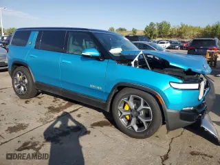 2023 Rivian R1S Adventure with VIN 7PDSGABA5PN027894, listed as a Copart auction lot 71442484 with 4,456 mi miles and Salvage Title. Bid and sale history available at carsss.com. Image 4.
