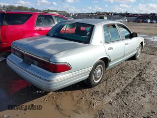 1996 Mercury Grand Marquis GS with VIN 2MELM74W7TX616694, listed as a IAAI auction lot 41216582 with 127,486 mi miles and . Bid and sale history available at DreamBid. Image 4.