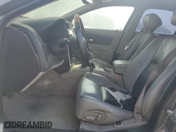 2004 Cadillac CTS with VIN 1G6DM577040148342, listed as a Copart auction lot 74488104 with 210,052 mi miles and Salvage Title. Bid and sale history available at carsss.com. Image 7.