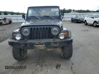 1997 Jeep Wrangler Sport with VIN 1J4FY19S2VP452229, listed as a Copart auction lot 60422775 with 164,346 mi miles and Clean title. Bid and sale history available at DreamBid. Image 5.