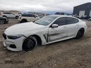 2020 BMW 8 Series M850i with VIN WBAGV8C05LCE00682, listed as a Copart auction lot 77863994 with 22,999 mi miles and Salvage Title. Bid and sale history available at carsss.com. Image 1.