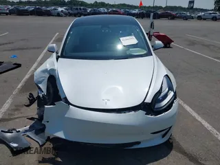 2023 Tesla Model 3 с VIN 5YJ3E1EAXPF645384, выставлен на аукционе IAAI как лот 42401955 с пробегом 18 031 миль миль и . История ставок и продаж доступна на DreamBid. Изображение 6.