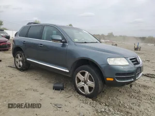 2004 Volkswagen Touareg with VIN WVGCM67L94D006541, listed as a Copart auction lot 50514195 with 132,278 mi miles and Salvage Title. Bid and sale history available at DreamBid. Image 4.