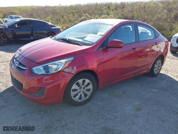 2015 Hyundai Accent GLS with VIN KMHCT4AE8FU833113, listed as a IAAI auction lot 40975977 with 143,038 mi miles. Bid and sale history available at carsss.com. Image 2.