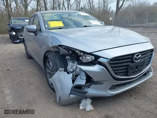 2018 Mazda Mazda3 4-Door Touring with VIN 3MZBN1V37JM262418, listed as a IAAI auction lot 41880212 with 118,662 mi miles. Bid and sale history available at carsss.com. Image 6.